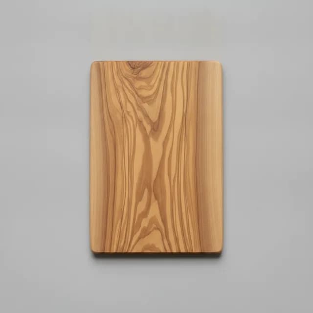 The reverse of a wooden board photographed against a plain ground
